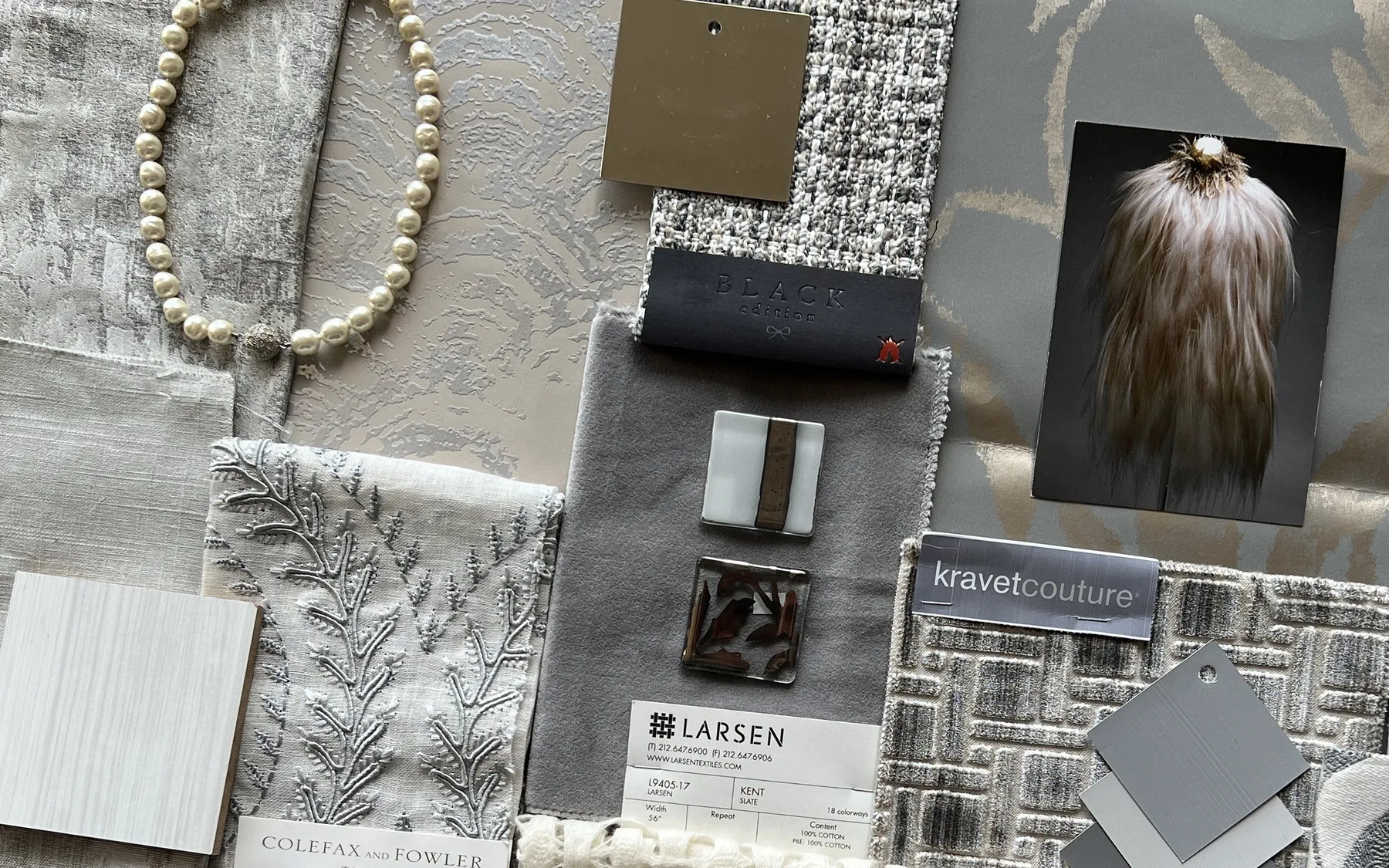 A design board: pearl gray, silver and textured neutrals.