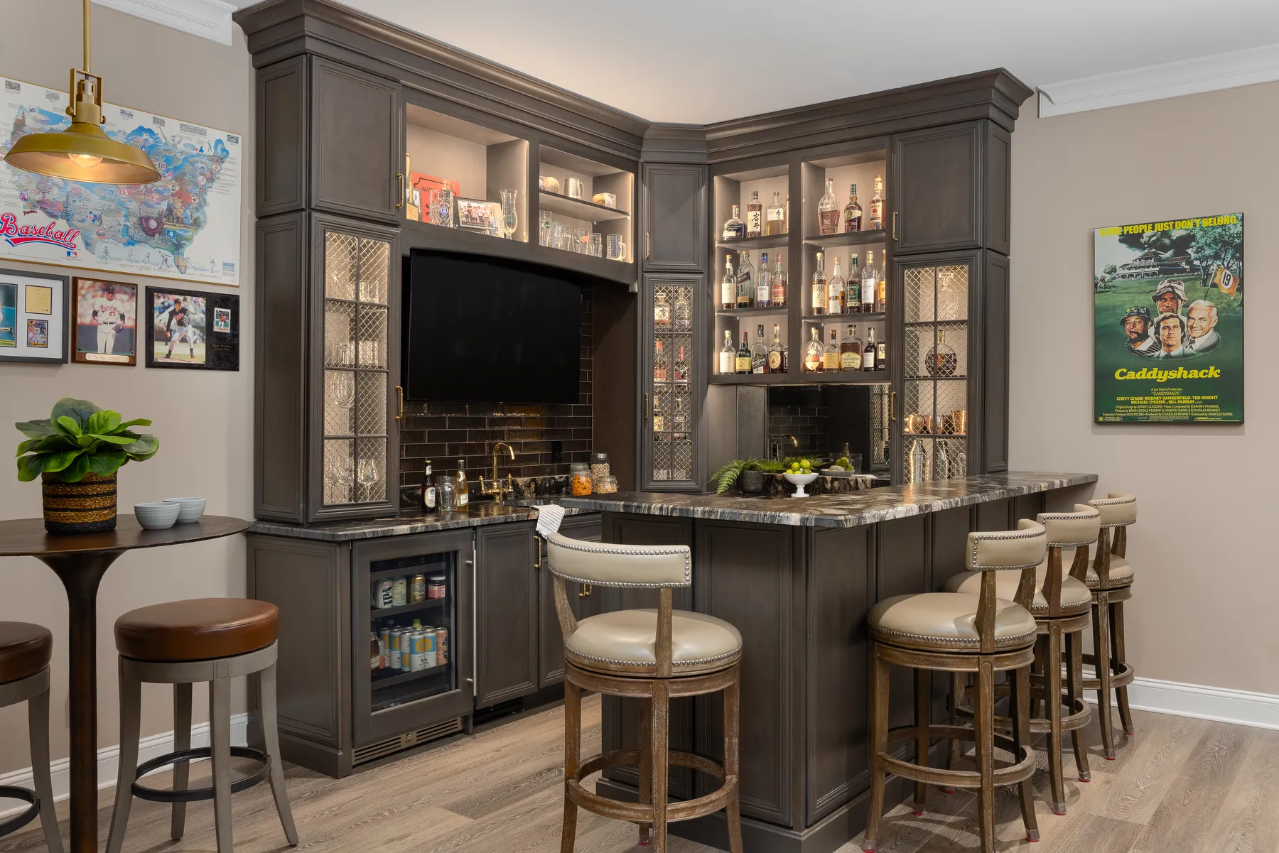 The downstairs lounge: a custom bar built for his collection.